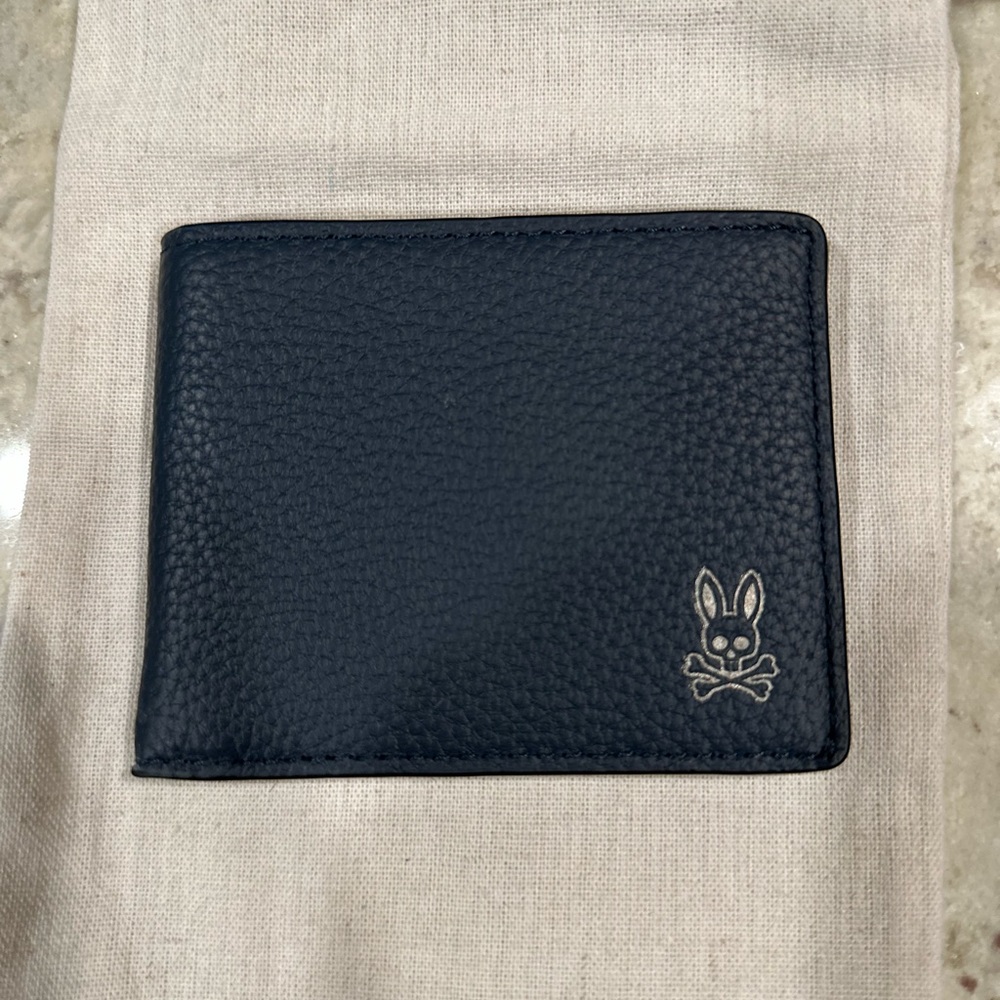 New Psycho Bunny Wallet.  Never been used still in original pouch